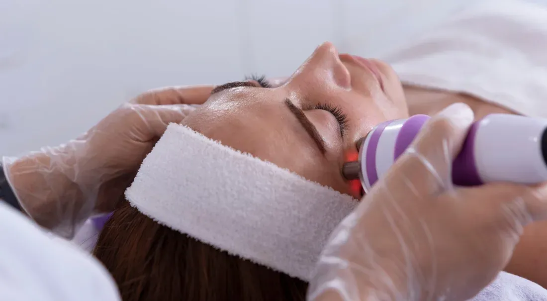 Device treatment on a woman's face