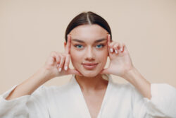 Ponytail Facelift - A Complete Guide // What is a Ponytail Facelift? // How Much Does a Ponytail Facelift Cost? // Factors that Impact the Cost of Ponytail Facelift // What Are the Benefits of a Ponytail Facelift? // How Is a Ponytail Facelift Different from Other Facelift Options? // Ponytail Facelift vs. Traditional Facelift // Ponytail Facelift vs. Mini Facelift // Ponytail Facelift vs. Extended Deep Plane Facelift // What to Expect Before and After a Ponytail Facelift // How Long Do the Results Last? // Is a Ponytail Facelift Right for You? // PGA Dermatology // Palm Beach Dermatology Group