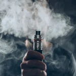 Vaping flavored e-liquid from an electronic cigarette - Does Vaping Cause Acne? - Palm Beach Dermatology Group