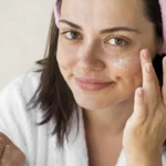medium shot woman using face cream - Can Tretinoin Cause Acne? A Simple Guide - Palm Beach Dermatology Group