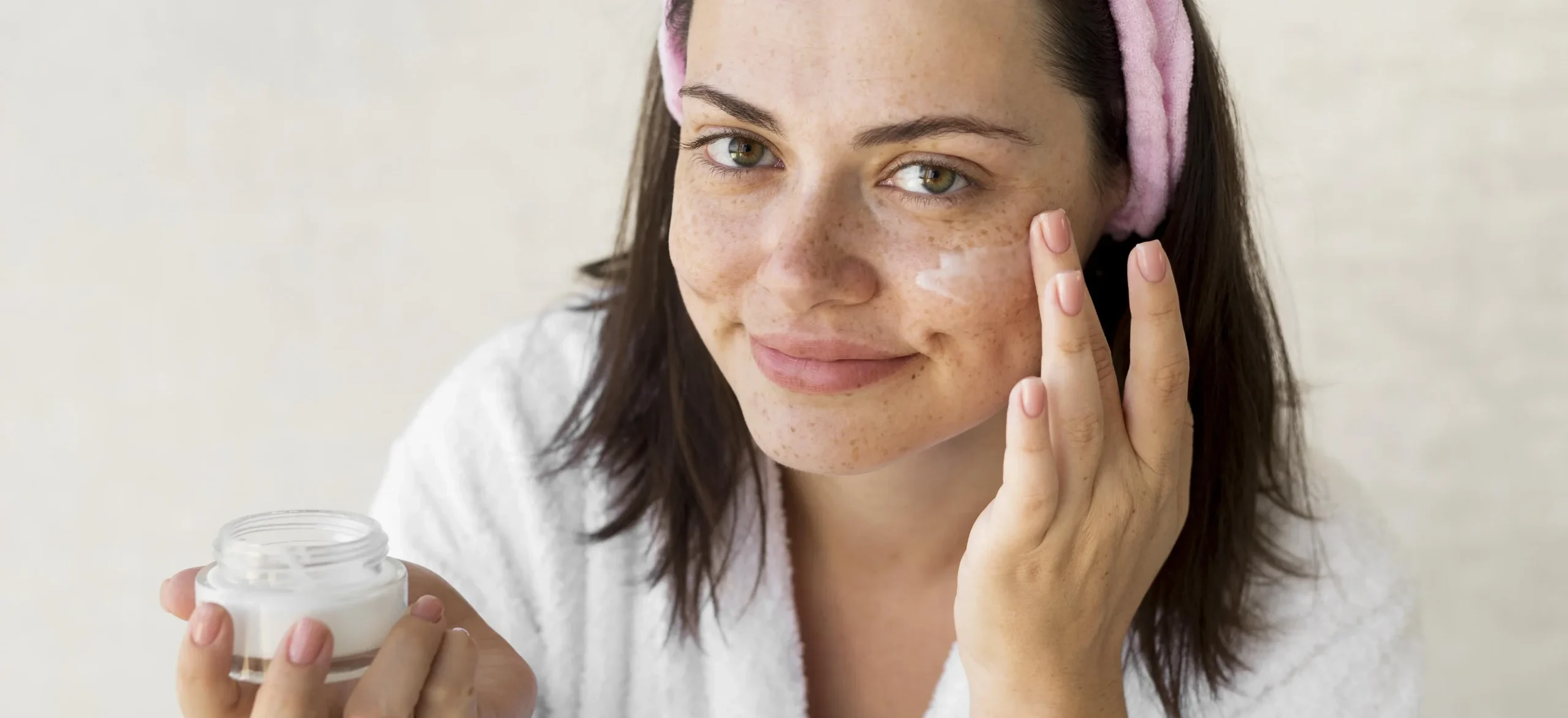 medium shot woman using face cream - Can Tretinoin Cause Acne? A Simple Guide - Palm Beach Dermatology Group