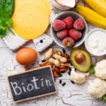Can Biotin Cause Acne? Everything You Need to Know - high biotin food on white wooden background